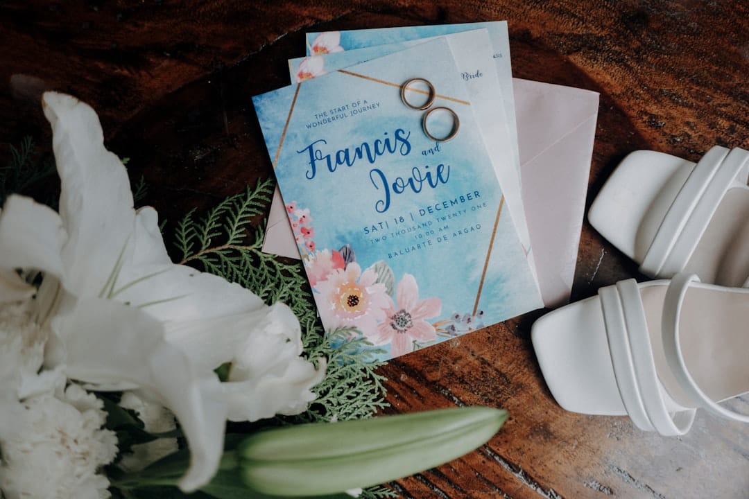 a couple of wedding rings sitting on top of a card